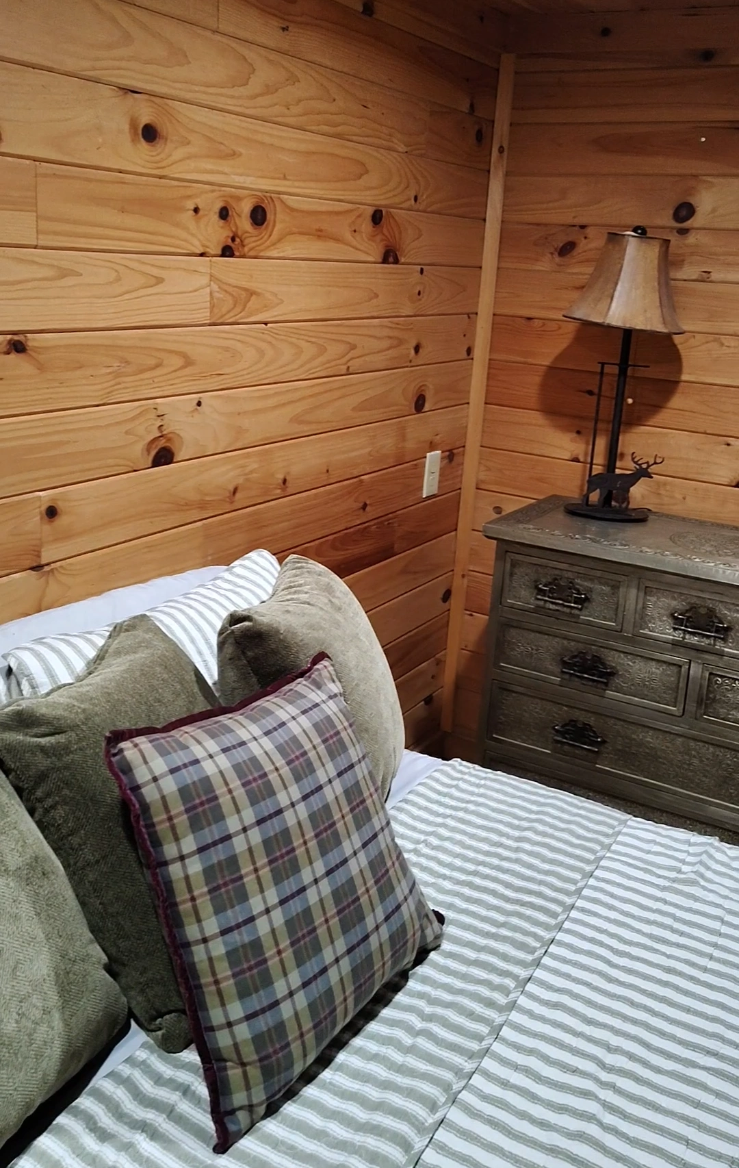 Hollar Hideaway bedroom decor for vacation rental at the Perfectly Imperfect Cabin in Turtletown, TN