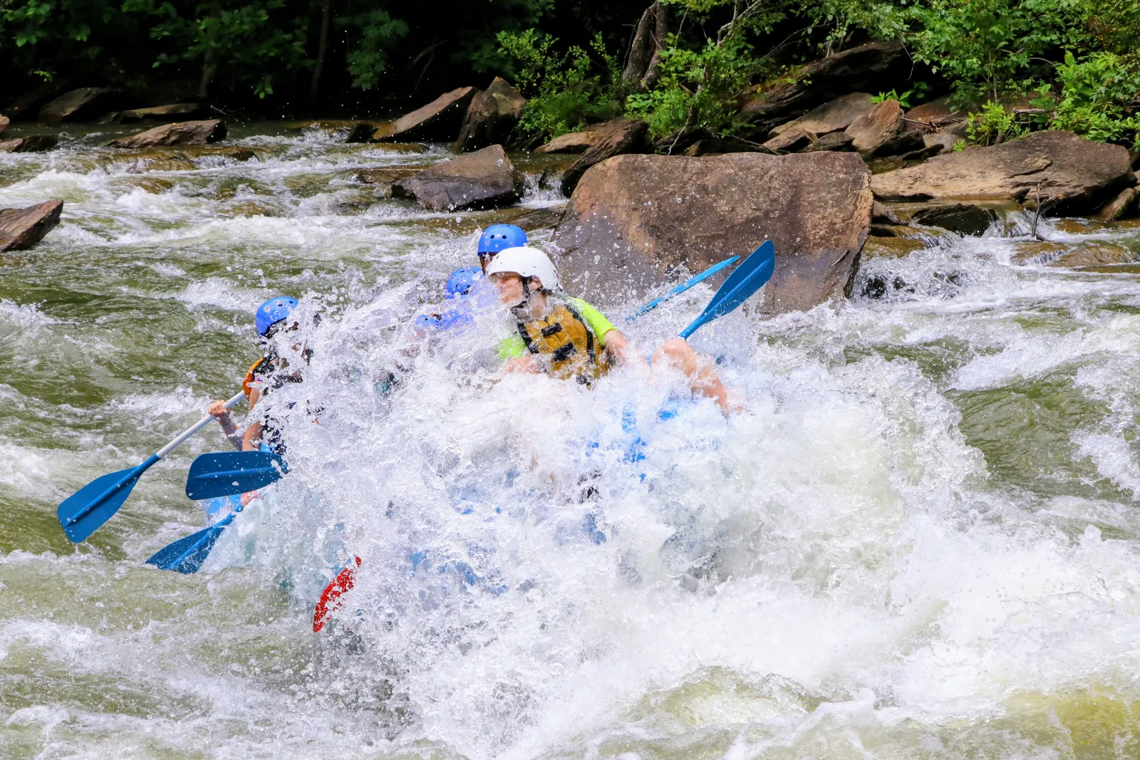 Our family splashing through legendary white water rapids on the Ocoee River near the Perfectly Imperfect Cabin.